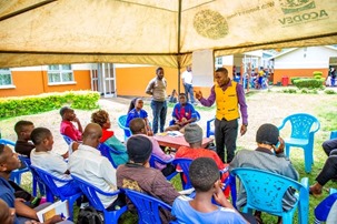 TURNING COMMITMENTS INTO ACTION: PROTECTING WOMEN AND GIRLS